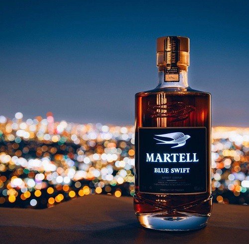 Bottle of Martell Blue Swift premium cognac with a smooth bourbon cask finish.